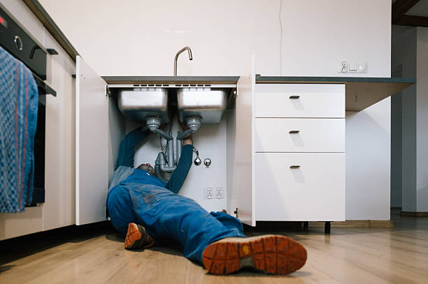Professional Emergency Plumber technician working in Brodhead, WI